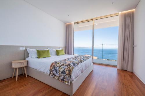 En eller flere senge i et værelse på Rada Villa - Heating Pool Optional