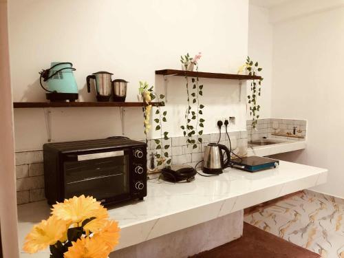 Η κουζίνα ή μικρή κουζίνα στο Umami Japanese House Tangalle