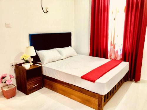 Ένα ή περισσότερα κρεβάτια σε δωμάτιο στο Umami Japanese House Tangalle