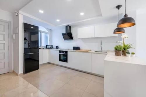 Triplex in the Heart of Málaga