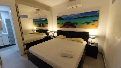 Postel nebo postele na pokoji v ubytování Punta Cana Beach Pool Bavaro 1