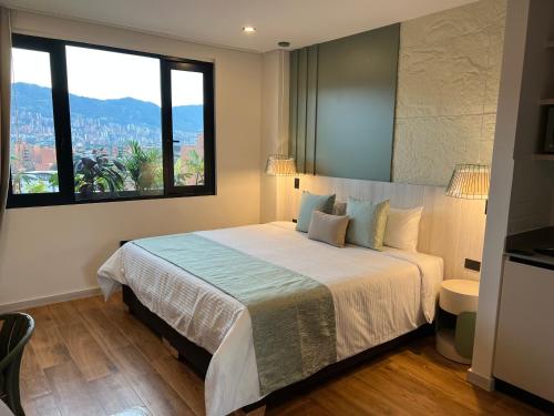 Giường trong phòng chung tại Hotel Ryo 74B