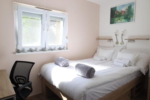 Ένα ή περισσότερα κρεβάτια σε δωμάτιο στο Pecó Kecó