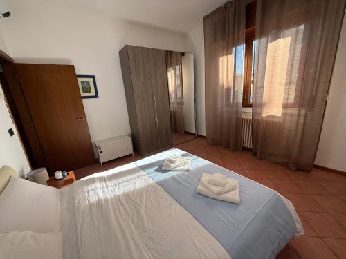 Una cama o camas en una habitación de Casa Viotti Monza