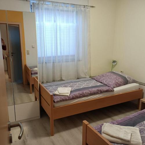 Postel nebo postele na pokoji v ubytování NEU! Ferienwohnung Biberburg EG