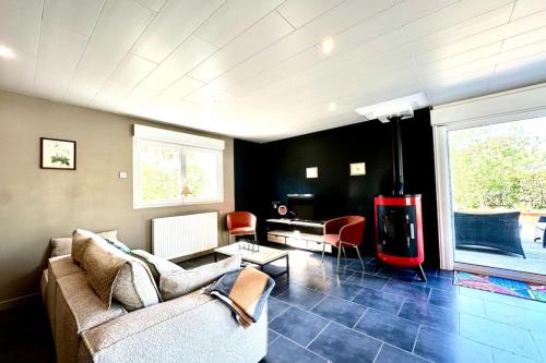 Χώρος καθιστικού στο La Framboisine -Plage à 6min-Jardin-WiFI-Parking