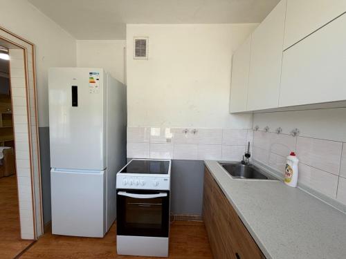 Dapur atau dapur kecil di Cozy apartment