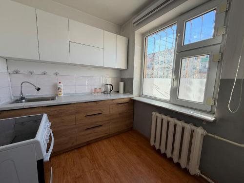 Dapur atau dapur kecil di Cozy apartment