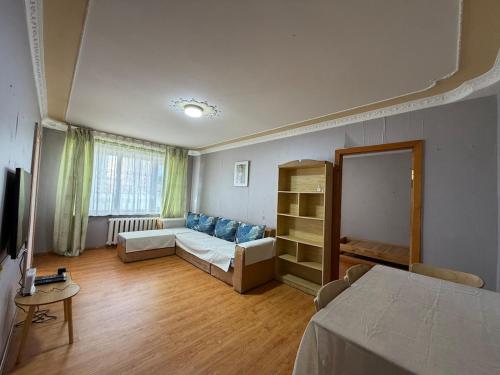 Katil atau katil-katil dalam bilik di Cozy apartment