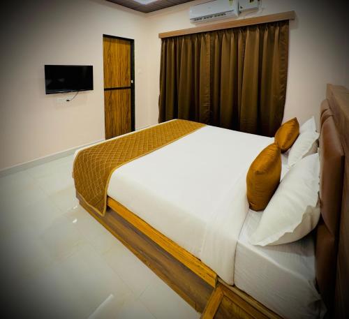 Postel nebo postele na pokoji v ubytování Seaside Beach Resort