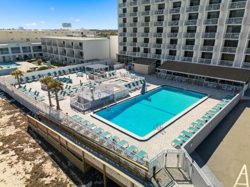 an overhead view of a swimming pool at a hotel at The Maverick Resort - Ormond Beach in Ormond Beach