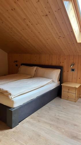 Ένα ή περισσότερα κρεβάτια σε δωμάτιο στο Appartamento Primavera 3