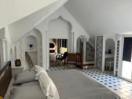 Postel nebo postele na pokoji v ubytování Duplex privatif, Piscine et Spa