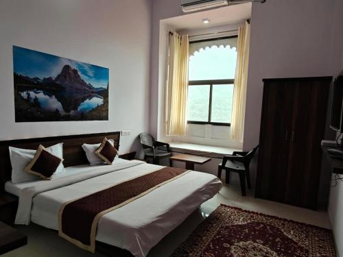 Postel nebo postele na pokoji v ubytování Jaigarh Palace Kumbhalgarh