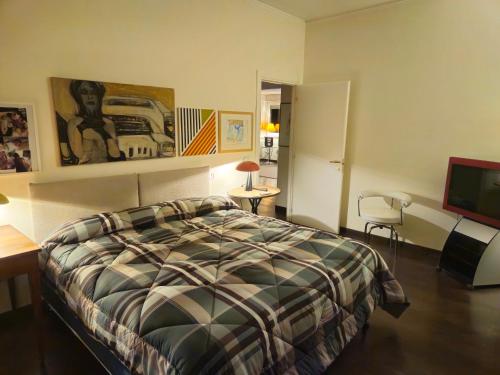 Ένα ή περισσότερα κρεβάτια σε δωμάτιο στο Casa Giotto