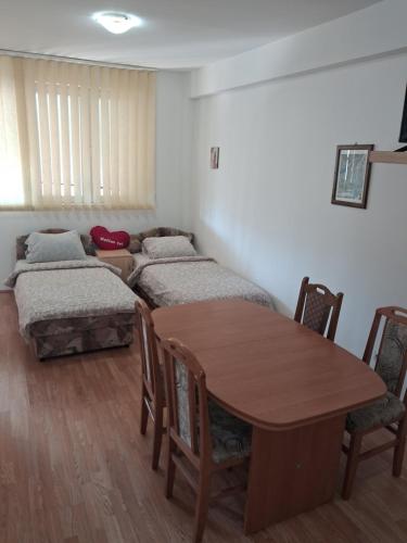 Postel nebo postele na pokoji v ubytování Apartman Tadija