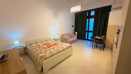 Ένα ή περισσότερα κρεβάτια σε δωμάτιο στο Annarella's Home