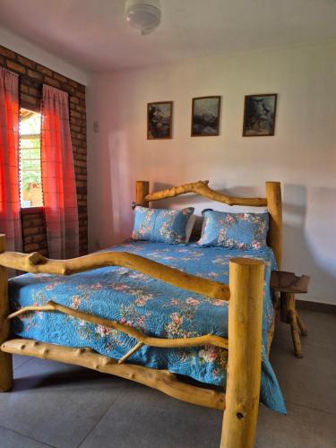 Ένα ή περισσότερα κρεβάτια σε δωμάτιο στο Casa dos sonhos 3 casais e 3 crianças