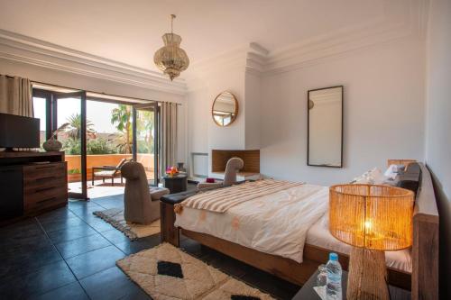 Postel nebo postele na pokoji v ubytování Villa familiale avec piscine et confort absolu