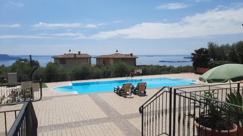 Πισίνα στο ή κοντά στο Oasi di Relax sul Lago di Garda