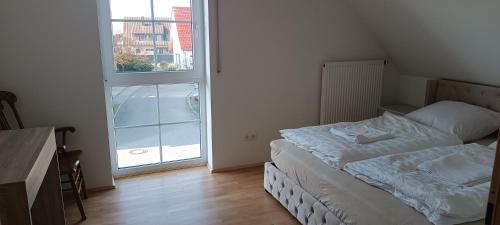 Cama o camas de una habitación en Domus Limes, RuheOase am Schloss