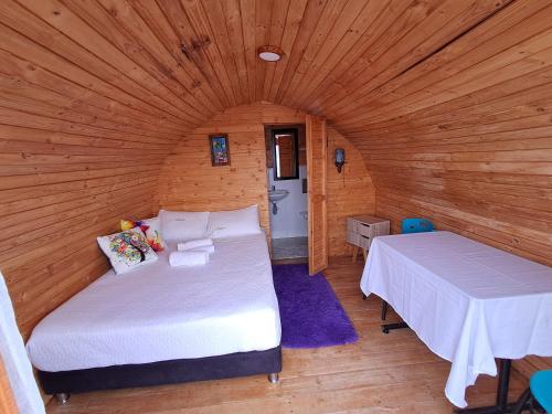 Postel nebo postele na pokoji v ubytování Cabaña Estelar