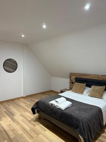 Ένα ή περισσότερα κρεβάτια σε δωμάτιο στο LairPure