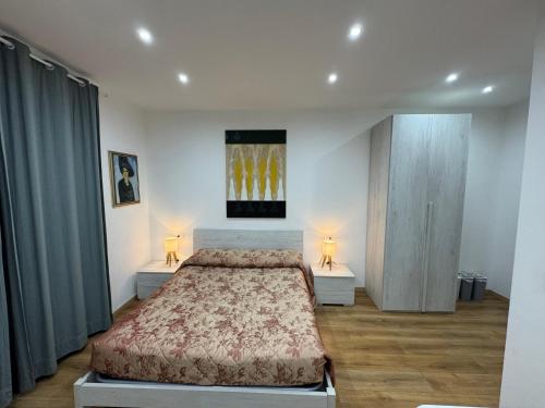 Postel nebo postele na pokoji v ubytování Aria di Casa Experience