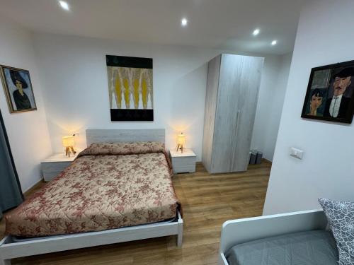 Postel nebo postele na pokoji v ubytování Aria di Casa Experience