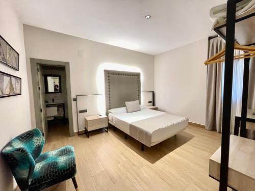 En eller flere senge i et værelse på Mape Loft Rural Aljibe