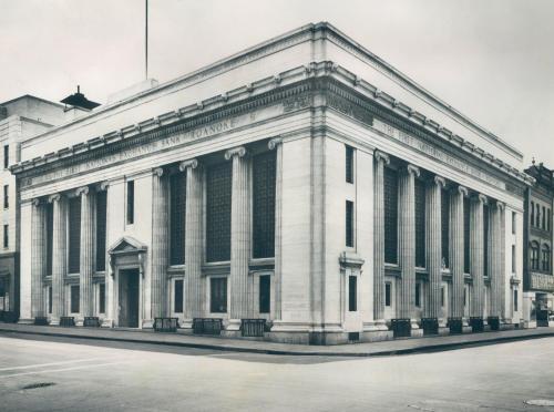 a black and white photo of a building with columns at The Promissory Hotel in Roanoke