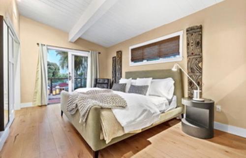 Ένα ή περισσότερα κρεβάτια σε δωμάτιο στο Pleasure Point Surf Retreat