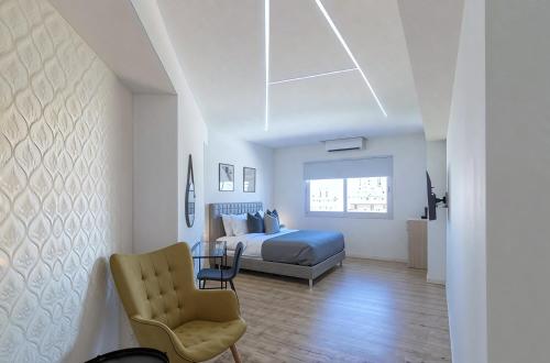 Χώρος καθιστικού στο Plateia suite Grigio