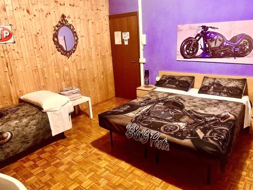 Una cama o camas en una habitación de Albergo della Posta