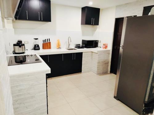 Fotografie z fotogalerie ubytování Stylish Home via a Samborondon v destinaci Estancia Vieja