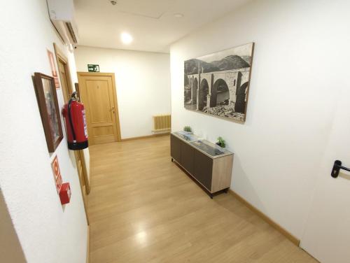 Kuchyň nebo kuchyňský kout v ubytování Hostal Hernan Cortes