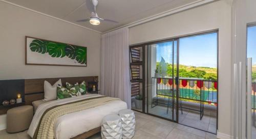 Giường trong phòng chung tại Mageba place