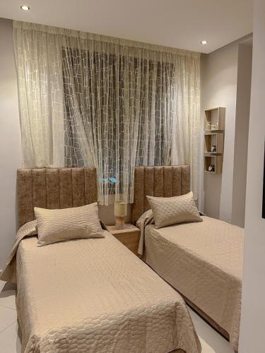 Postel nebo postele na pokoji v ubytování Luxury apartment in Tangier