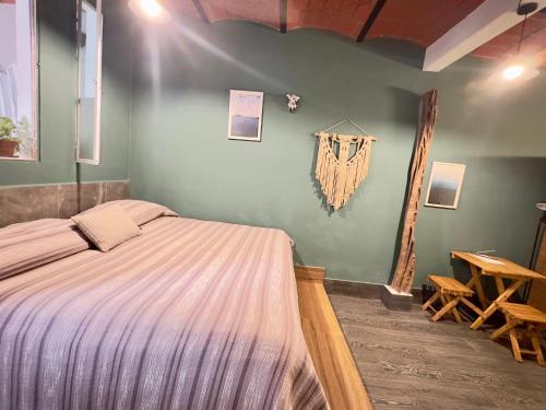 Ένα ή περισσότερα κρεβάτια σε δωμάτιο στο Palapa Chili #