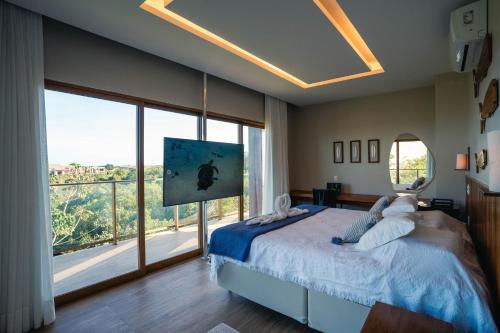 Postel nebo postele na pokoji v ubytování Casa Oceano- Praia do Forte