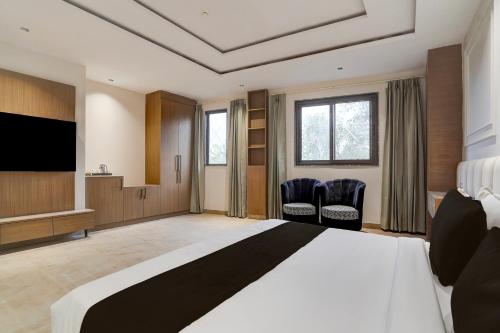 TV a/nebo společenská místnost v ubytování HOTEL O ELVILLA