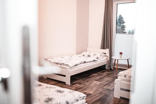 Postel nebo postele na pokoji v ubytování Na Mandlu