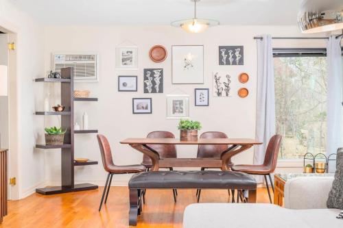 a dining room with a table and chairs at Private Riverside Retreat in Appleton
