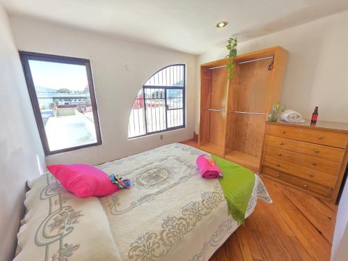 Ένα ή περισσότερα κρεβάτια σε δωμάτιο στο Bamboo Habitación Talavera 1