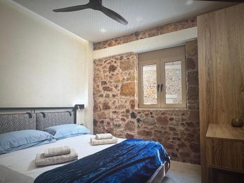 Ένα ή περισσότερα κρεβάτια σε δωμάτιο στο Malia super views