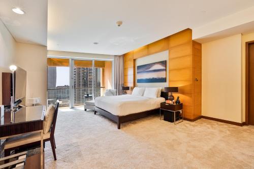 Ένα ή περισσότερα κρεβάτια σε δωμάτιο στο Luxurious Studio with Burj Khalifa View Direct Dubai Mall Access - Kempinski Residence
