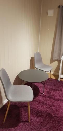 Χώρος καθιστικού στο Rolig overnatting med utsikt til Fjellheisen