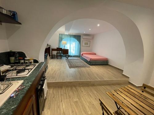 Ένα ή περισσότερα κρεβάτια σε δωμάτιο στο Spazio apartments Etnea