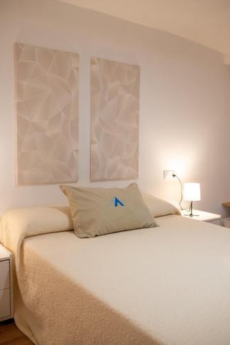 Ένα ή περισσότερα κρεβάτια σε δωμάτιο στο La bodega de la Yaya