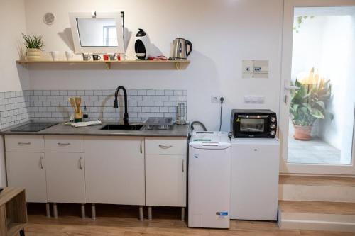 Η κουζίνα ή μικρή κουζίνα στο La bodega de la Yaya